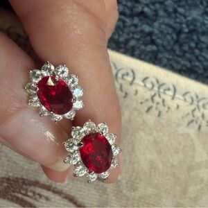 Screw back pierced earrings. Red stone with cubic zirconia’s.